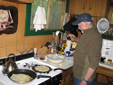 Janos Kovacs whipping up breakfast